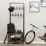 Juodo metalo kabykla paltams 9 kabliukai