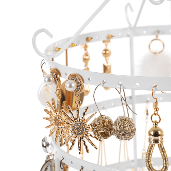 Baltos spalvos juvelyrinis stovas “Karuselė”